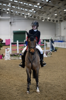 Lucy Capper & Playboy Van De Zoetewei win the Winter 138 2nd round at Aintree Small Pony Premier 2023